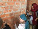 Именные кирпичики подписали учащиеся воскресной школы на стенах строящегося Реабилитационного цента для детей-инвалидов в городе Пинске.